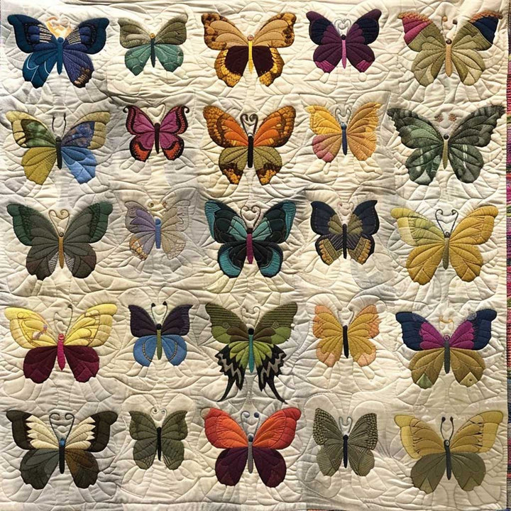 Steppdecke mit Schmetterlingssammlung