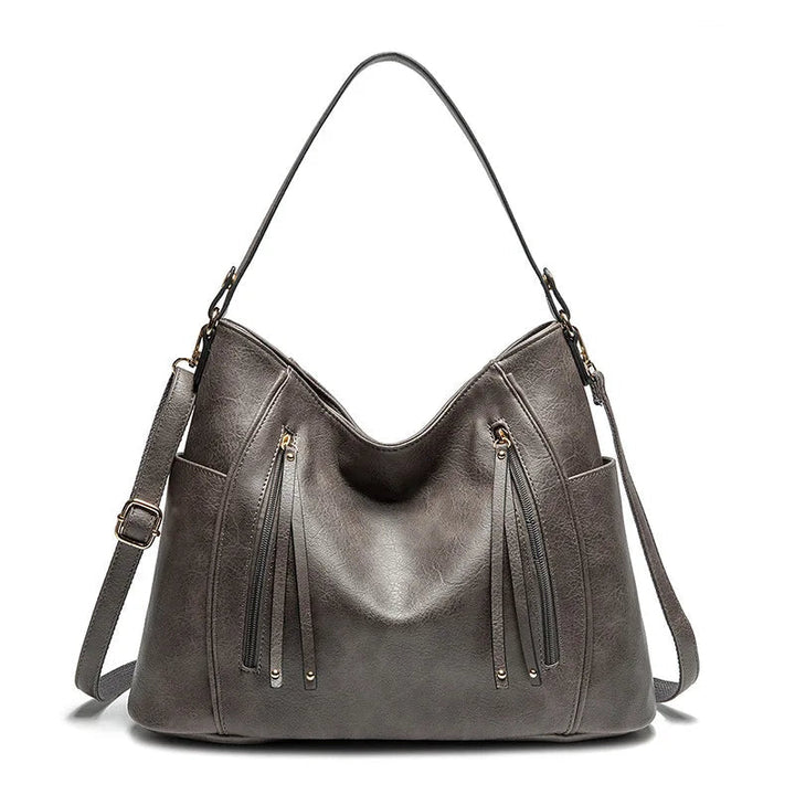 Paula | Ledertasche mit Fransen-Design
