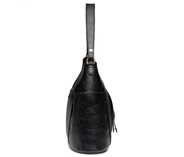 Paula | Ledertasche mit Fransen-Design