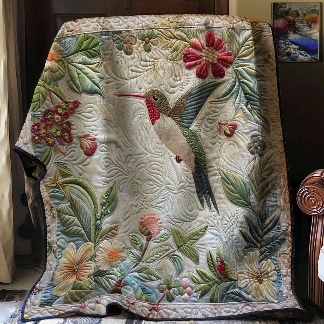 Steppdecke mit Kolibri und Blütenranken