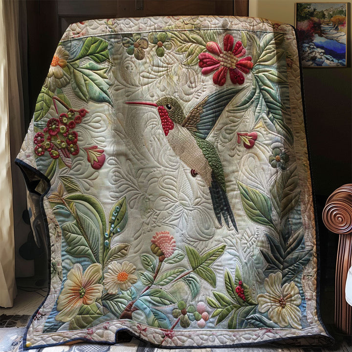 Steppdecke mit Kolibri und Blütenranken