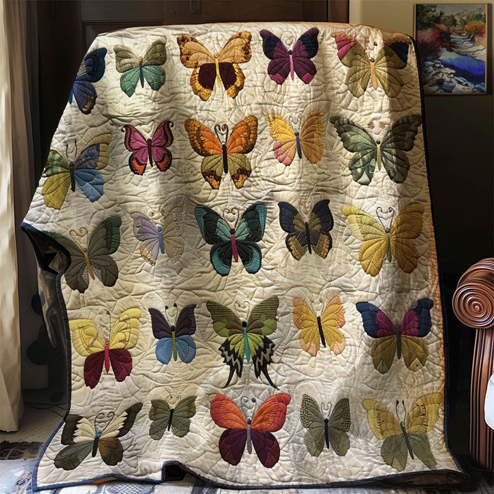 Steppdecke mit Schmetterlingssammlung