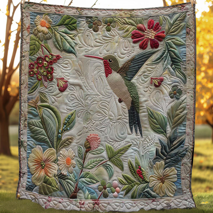Steppdecke mit Kolibri und Blütenranken