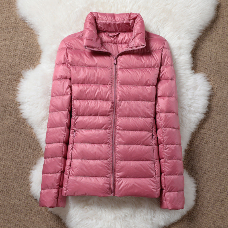 Berit | Damen Daunenjacke in Lachsfarbe, leicht und bequem