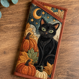 Gestepptes Brillenetui – Schwarze Katze unter dem Halloween-Mond