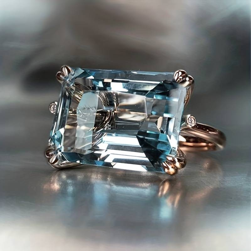 Ring mit blauem Kristall