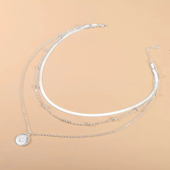 Dreifaches silbernes Halsband